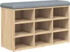 A shoe bench with multiple compartments and a padded top. Náhled obrázku produktu