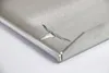 A close-up of a damaged metal plate, likely a grill plate, showing a tear in the surface. Produktbild-Vorschau