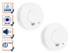 Two white smoke detectors are shown against a white background, with a series of icons and text on the left side of the image highlighting product features. Produktbild-Vorschau