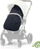 A navy blue quilted footmuff is placed inside a stroller. Produktbild-Vorschau