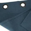 Close-up view of a blue curtain with grommets. Produktbild-Vorschau