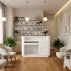 A clean and modern reception desk in a salon or spa setting. Produktbild-Vorschau