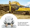A close-up of a car relay with an excavator in the background. Produktbild-Vorschau