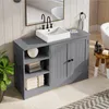 A bathroom vanity with a sink and storage cabinets. Voir les images du produit