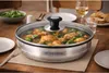 A pot of food on a dining table. Produktbild-Vorschau
