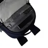Close-up view of the interior of a navy blue backpack, showing pockets and items inside. Produktbild-Vorschau