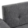 A close-up view of the textured fabric of a gray sofa. Produktbild-Vorschau