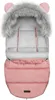 A pink stroller footmuff with a faux fur hood and bear ears. Produktbild-Vorschau