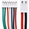 Close-up of two white electrical connectors with wires of various colors. Náhled obrázku produktu