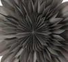 A close-up, detailed view of a gray paper star decoration. Produktbild-Vorschau