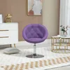 A purple armchair is placed in a living room setting next to a white dresser and a round coffee table. Produktbild-Vorschau