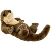 A plush toy otter lying on its back against a white background. Produktbild-Vorschau
