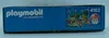 The side of a Playmobil box showing the brand logo, a scene from the toy set, and the product number. Produktbild-Vorschau