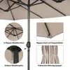 Close-up details of a beige patio umbrella, highlighting its structure and features. Anteprima dell’immagine prodotto