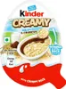 The image shows the packaging of a Kinder Creamy Milky & Crunchy chocolate egg with crispy rice. Produktbild-Vorschau