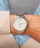 A person wearing a watch on their wrist. Podgląd zdjęcia produktu