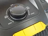 A close-up view of the control panel of a vacuum cleaner, showing a dial with icons and markings for different settings. Produktbild-Vorschau