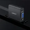 A black Ugreen HDMI to VGA converter with a blue VGA port is shown on a reflective black surface. Voir les images du produit