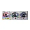 A product package containing three round containers of modeling clay, each with a cartoon monster design and a glowing LED ball. Podgląd zdjęcia produktu