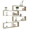 A collection of four wooden cube shelves arranged in a staggered pattern against a white background, displaying various decorative items. Náhled obrázku produktu