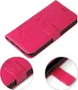 A pink floral flip phone case is shown from a diagonal angle. Produktbild-Vorschau