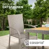 A garden setting with outdoor furniture, including chairs and a table, with trees and a hammock in the background. Produktbild-Vorschau