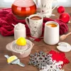 A cozy winter scene with tea, honey, and festive decorations. Náhled obrázku produktu