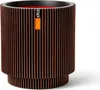 A cylindrical planter with a ribbed texture and a label. Produktbild-Vorschau