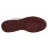 The sole of a white and red sneaker is shown against a white background. Anteprima dell’immagine prodotto