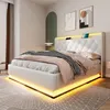 A modern white bed with LED lighting in a bedroom setting. Anteprima dell’immagine prodotto