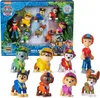 A gift set of Paw Patrol Jungle Pups action figures, displayed in and around their packaging. Náhled obrázku produktu