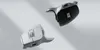 Two Logitech MX Master 3S wireless mice, one white and one black, are shown floating against a light gray and white background. Voir les images du produit