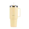 A yellow insulated tumbler with a handle and straw, presented against a white background. Anteprima dell’immagine prodotto