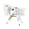 A white drying rack with clothes and a teddy bear on it, against a white background. Podgląd zdjęcia produktu