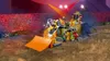 A LEGO stunt park with a motorcycle performing a jump, surrounded by a stadium audience and obstacles. Podgląd zdjęcia produktu