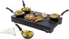 A black raclette grill with food items on it, set against a white background. Náhľad obrázku produktu