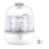 A baby bottle sterilizer with bottles inside, shown on a white background. Podgląd zdjęcia produktu