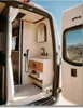 Interior of a van converted into a bathroom with a bidet faucet. Podgląd zdjęcia produktu
