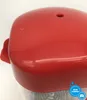 Close-up of the red top of a hot dog maker. Produktbild-Vorschau