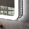 A close-up view of a modern bathroom mirror with integrated LED lighting, mounted on a textured wall. Produktbild-Vorschau