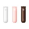 Three handheld fans in different colors arranged in a row against a white background. Produktbild-Vorschau