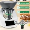 A close-up marketing image of a food processor attachment, with text overlays highlighting its features and a loaf of bread in the background. Produktbild-Vorschau