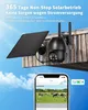 A solar-powered security camera mounted on a wooden structure, with a smartphone displaying a live feed of cows in a field. Náhled obrázku produktu