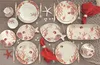 A collection of marine-themed dinnerware set on a wooden table. Produktbild-Vorschau