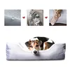 A dog lying in a dog bed, with three smaller images above showing the bed's features. Produktbild-Vorschau