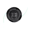 A black string trimmer head with green trimmer line on a white background. Produktbild-Vorschau