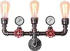 A wall-mounted light fixture with a retro, industrial design. Náhled obrázku produktu