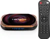 A smart TV box and its remote control are displayed on a white background. Náhled obrázku produktu