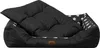A black dog bed with a white paw print pattern on the inside lining. Náhled obrázku produktu