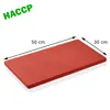 A red cutting board with dimensions indicated. Anteprima dell’immagine prodotto